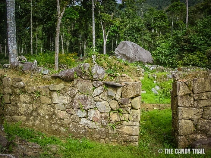 gate and walls of vilcabamba ruins in peru