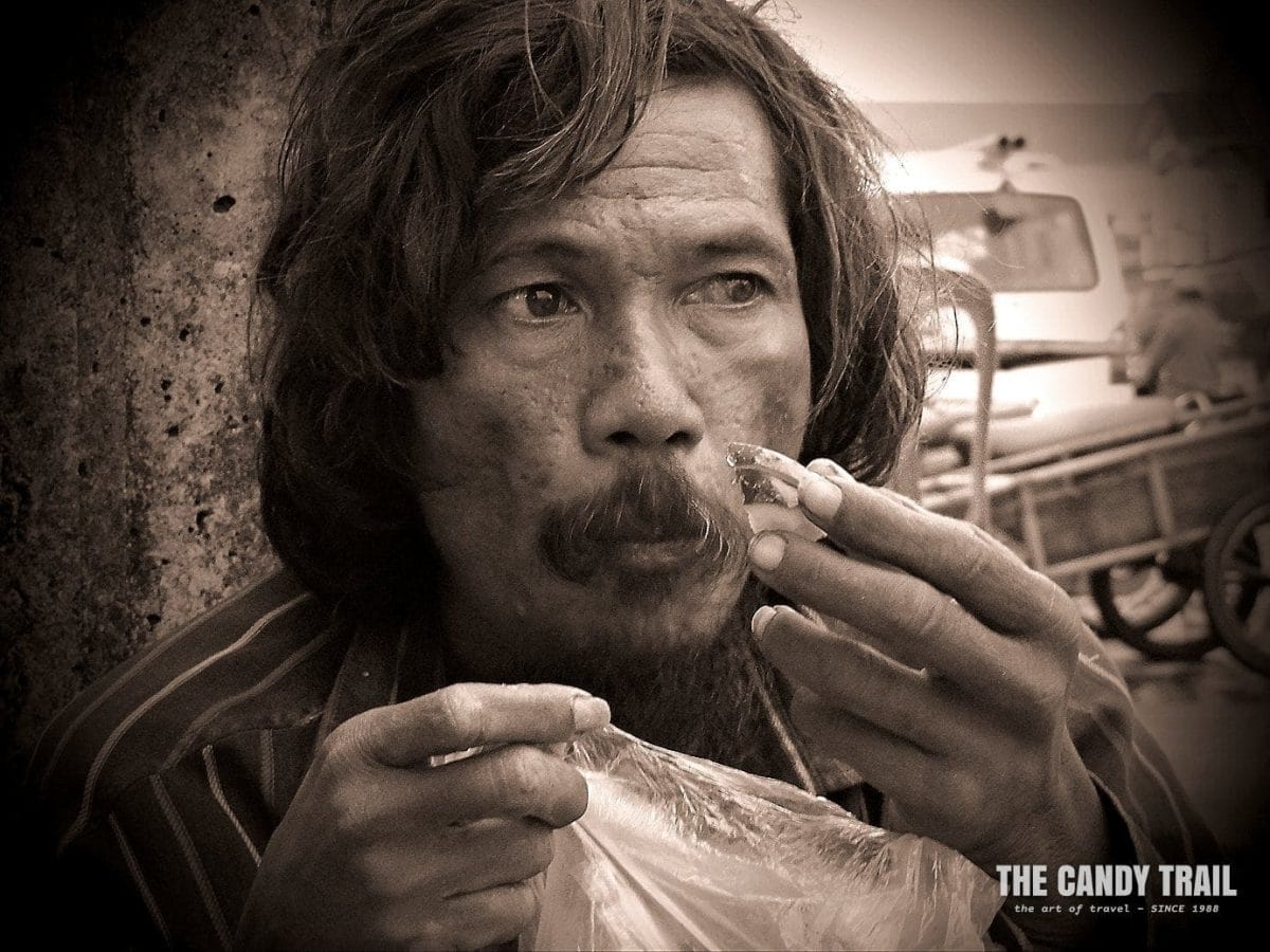 crazy street guy gets a meal Cambodia video