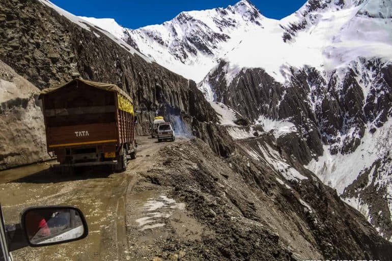 leh-highway-trucks-on-mountain-road