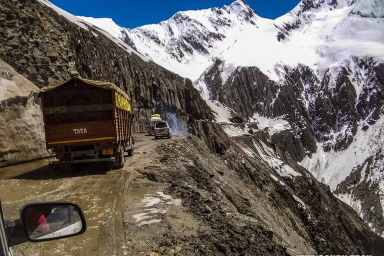 leh-highway-trucks-on-mountain-road