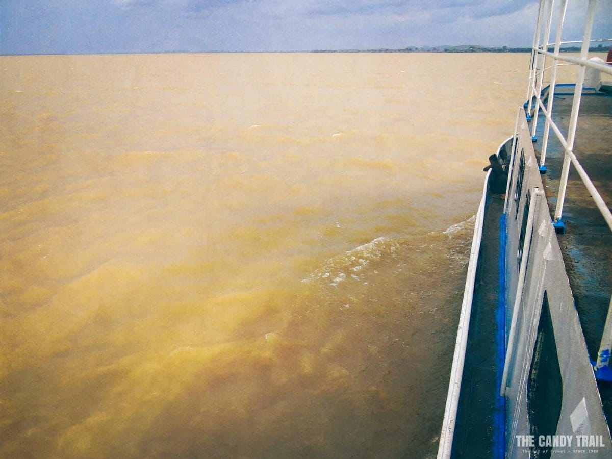 copper colored water on lake tana ferry ride ethiopia 