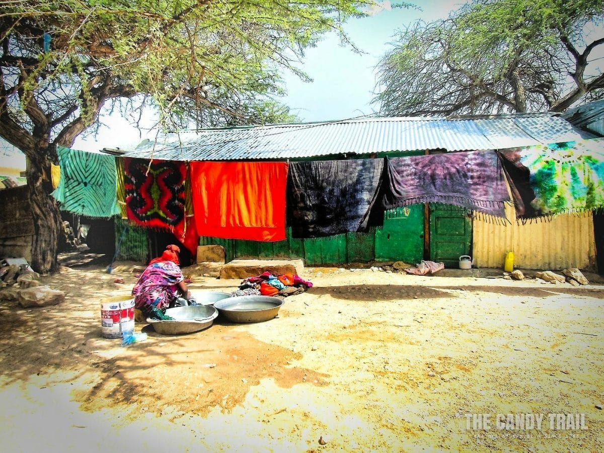 women-washing bright cloth in Hargeisa
