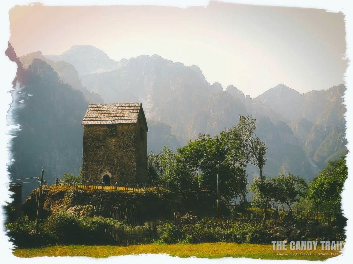ancient lock-up tower in Theth amid peaks of albania