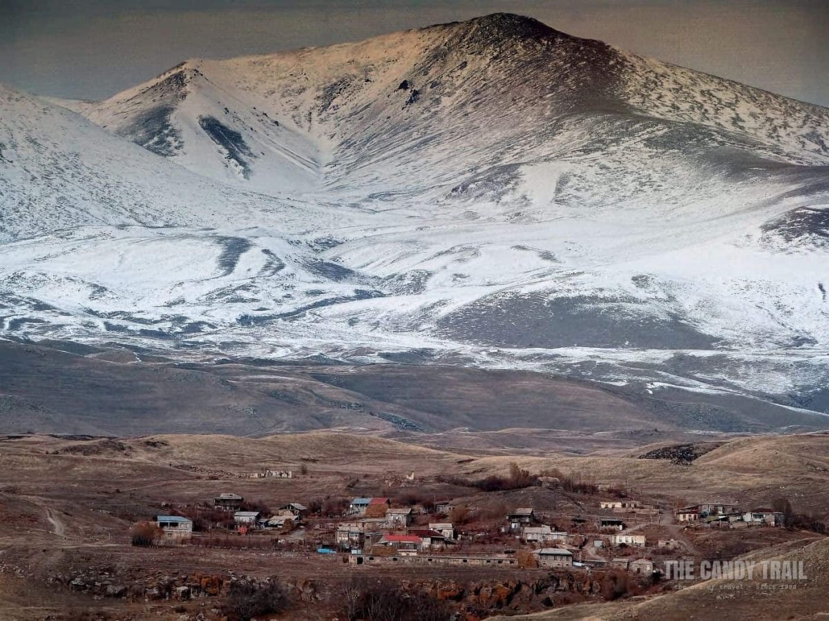 Village Against Snow Mountain Armenia