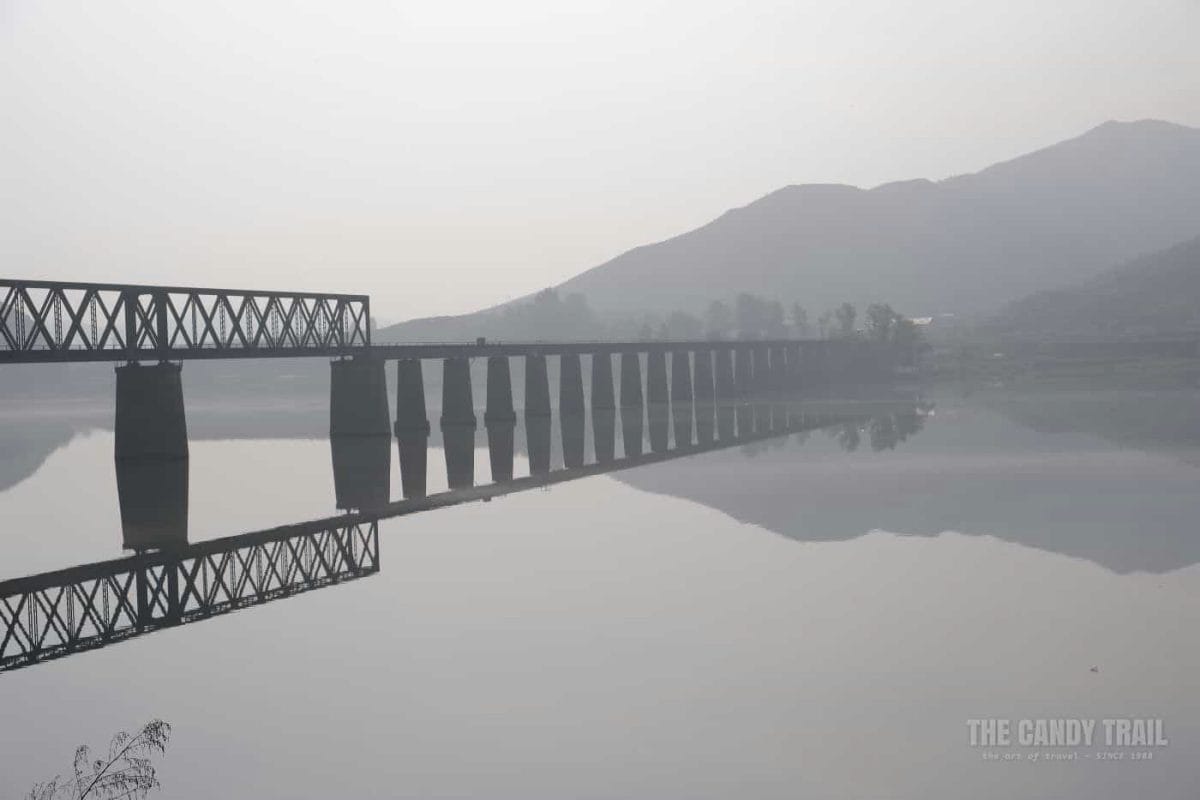 Early Morning Misty Bridge Across Yalu River To North Korea