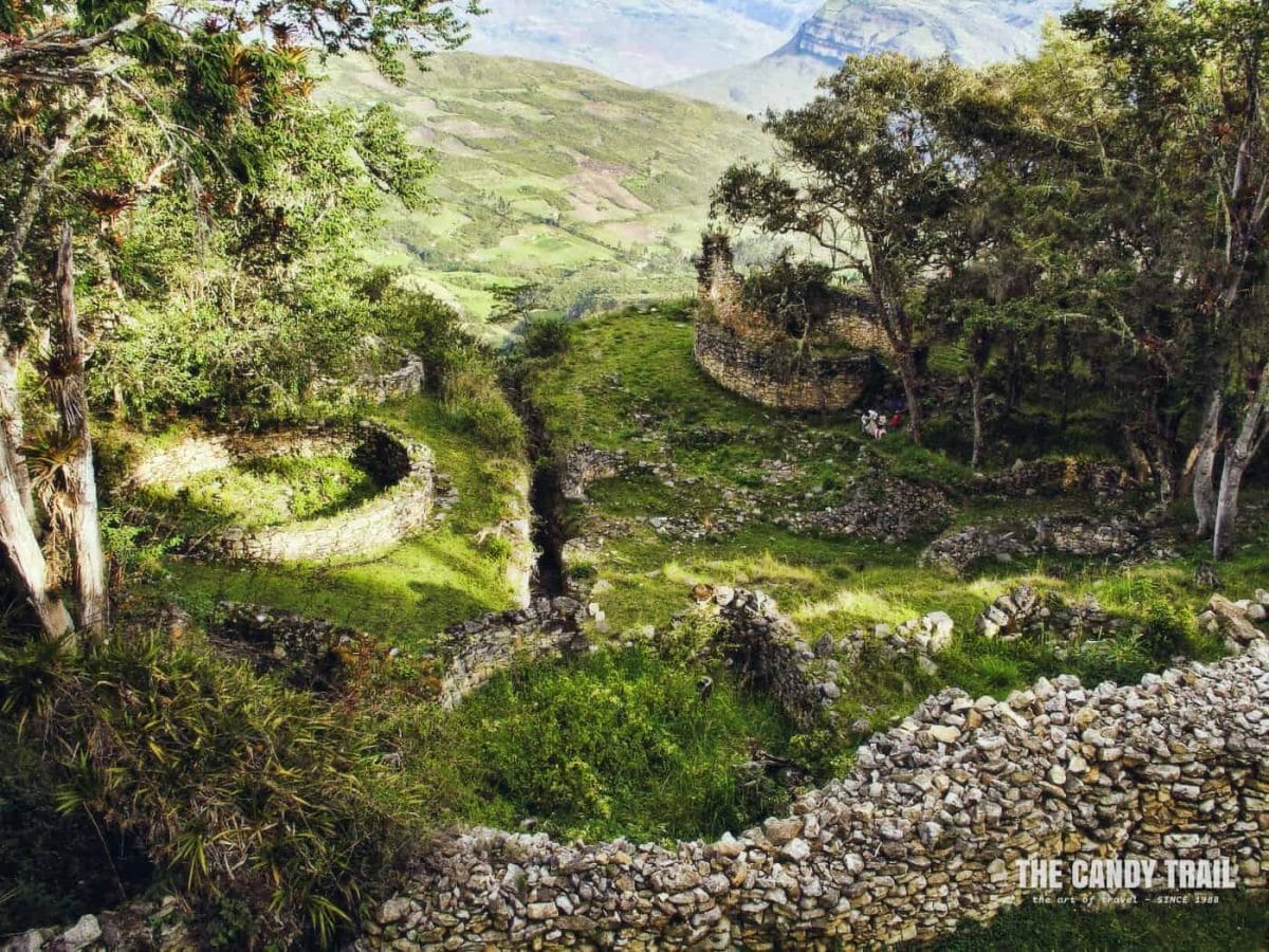 the narrow stone entrance of the kuelap city ruins
