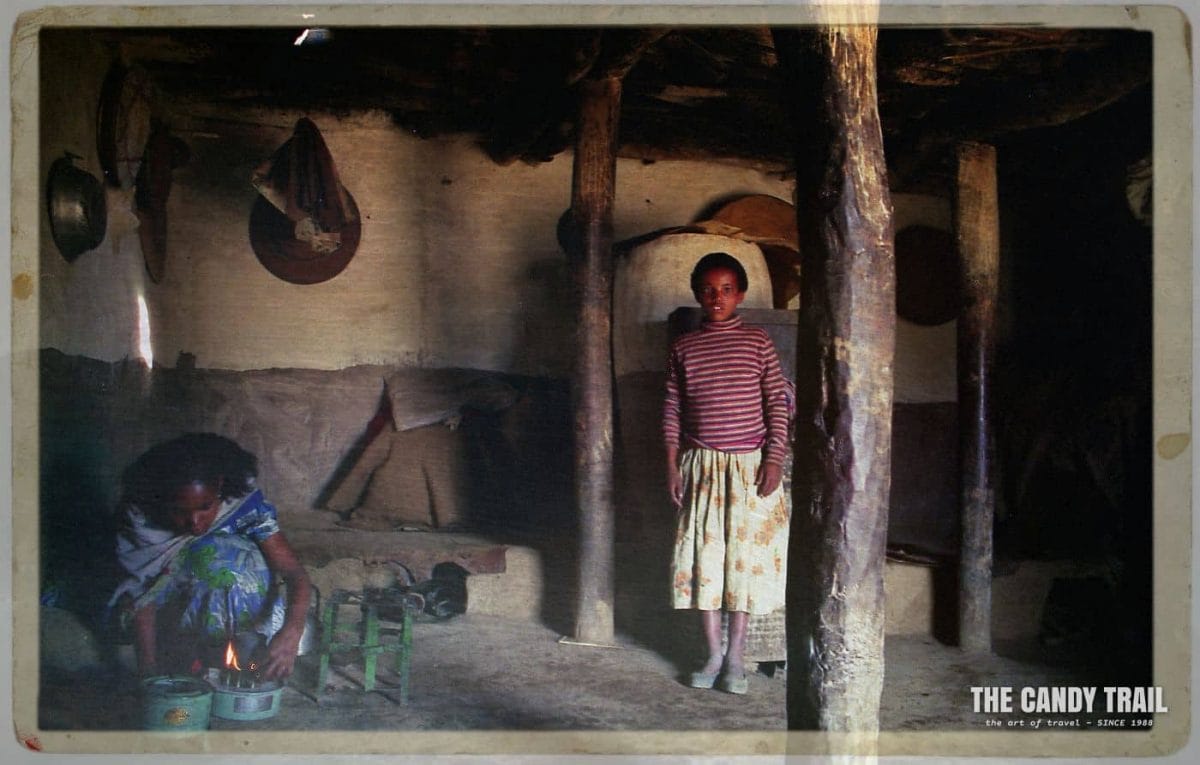 Inside the house and Mamayta prepares a fire for tea