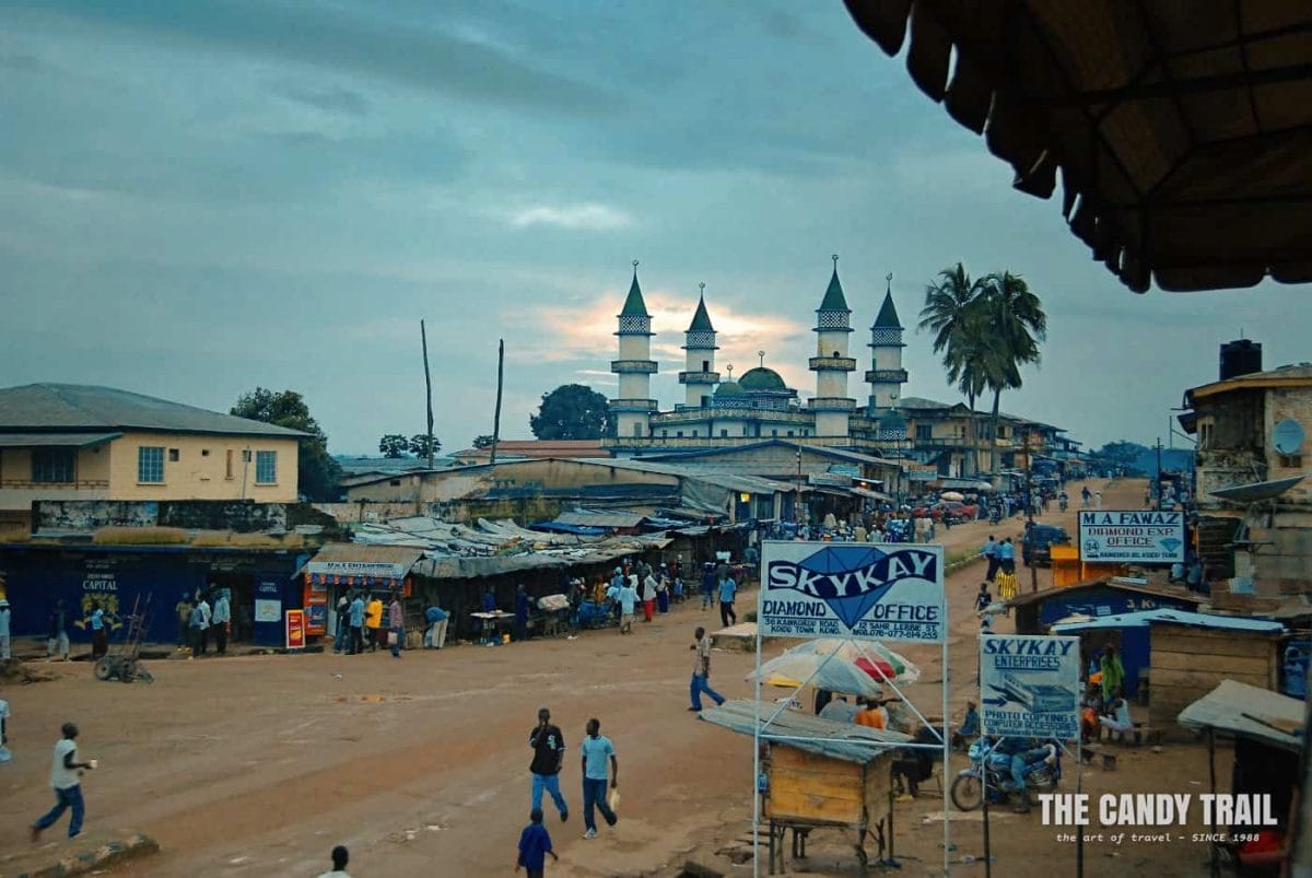 mainstreet of Kono and mosque at dusk sierra leone diamond mines visit