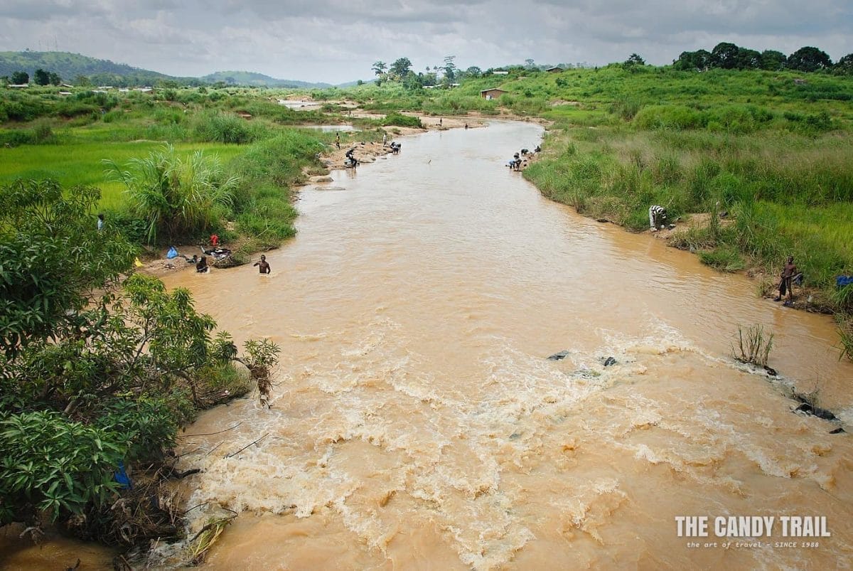 blood diamonds of sierra leone miners near Kono amid a river