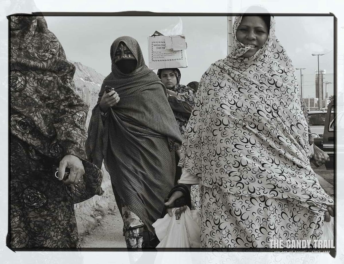 Women with shopping leave the Minab Market