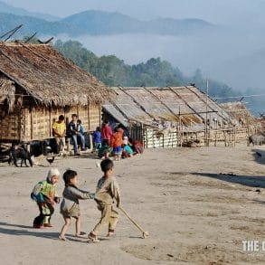 kids playing akha tribe village laos