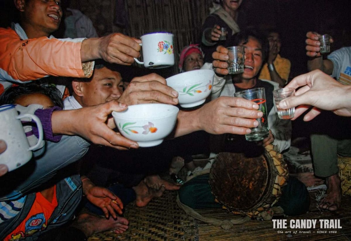 Drinking Lao-Lao with Akha people in the village during the evening