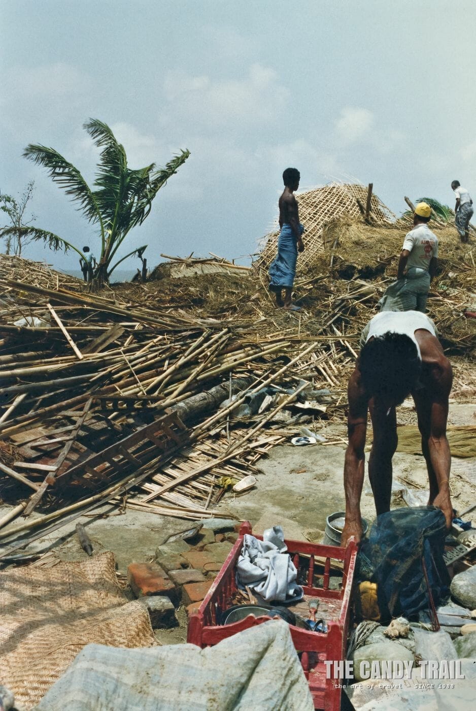 Salvaging belonging in Cox's Bazar, after a cyclone in Bangladesh 1991