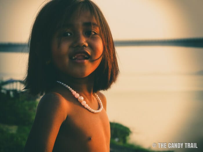 young girl sunset smile cambodia